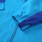 Close-up of the ultra-soft brushed fabric and sturdy zipper on a youth lightweight fall coat.