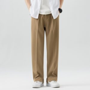 c5085147-0bc6-46f8-ac06-a5b770622698.jpg A stylish man wearing comfortable mens casual suit pants for a smart casual office look.