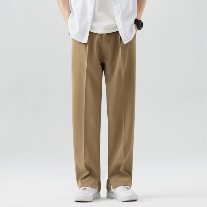 c5085147-0bc6-46f8-ac06-a5b770622698.jpg A stylish man wearing comfortable mens casual suit pants for a smart casual office look.
