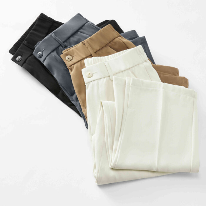 c70221c0-1747-4d8d-bb14-9abfbe1d6550.jpg A stylish man wearing comfortable mens casual suit pants for a smart casual office look.
