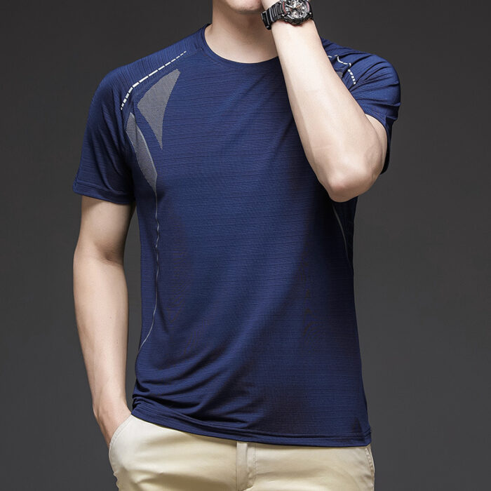 A man staying cool in the summer heat wearing a breathable mens ice silk t shirt.
