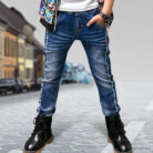 Close-up of the neat waistband and comfortable cotton fabric on kids casual denim pants.