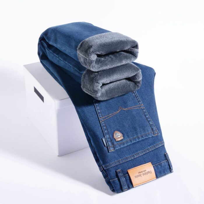 d2f67c25-4175-4a80-b9ed-3ccc370f9ad6.jpg Handsome young man wearing comfortable mens straight leg jeans.