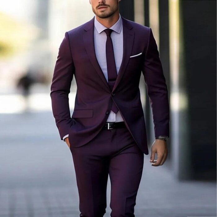 d3238568-893e-4c3d-80d7-f30f68f05c45.jpg Handsome young man wearing a stylish mens slim fit two piece suit.