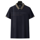 A professional man wearing a classic mens cotton polo shirt ph for a smart casual office look.