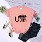 Stylish young woman wearing a trendy queen graphic t shirt women for summer.