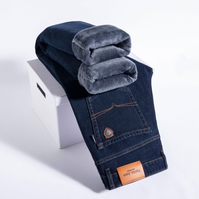 d9858db4-797e-4563-b0ad-e1cec0a50daf.jpg Handsome young man wearing comfortable mens straight leg jeans.
