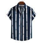 A stylish man wearing a classic mens short sleeve striped shirt for a casual summer look.