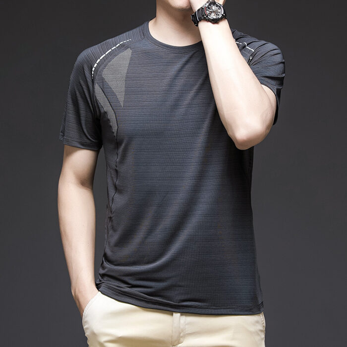 A man staying cool in the summer heat wearing a breathable mens ice silk t shirt.