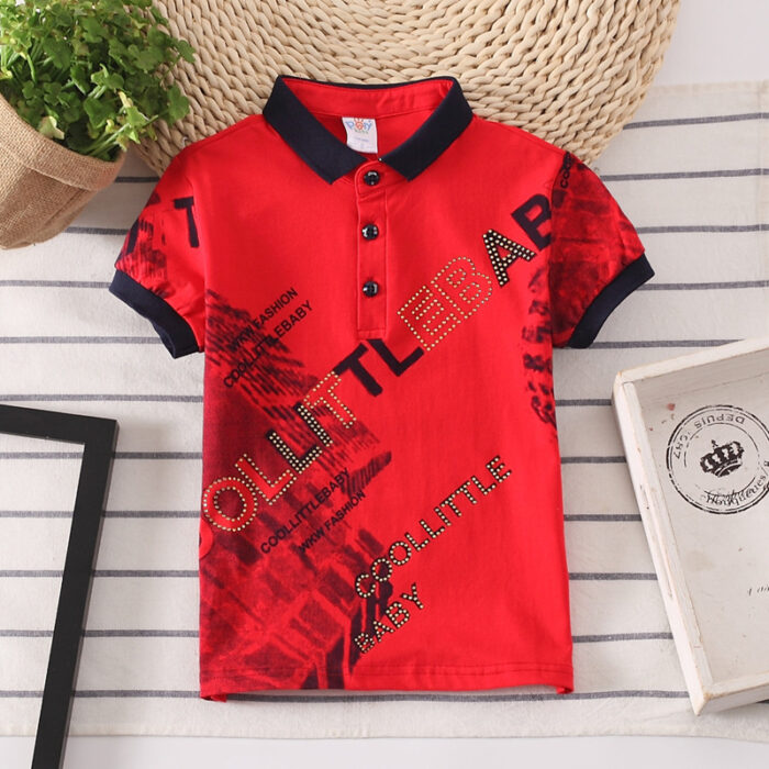 e4f77622-c41d-4eb1-881b-356d5159e058.jpg A handsome little boy wearing a breathable boys cotton polo shirt ph for a family weekend outing.