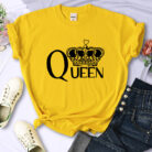 Close-up of the bold crown print and breathable fabric on a crown print cotton shirt.