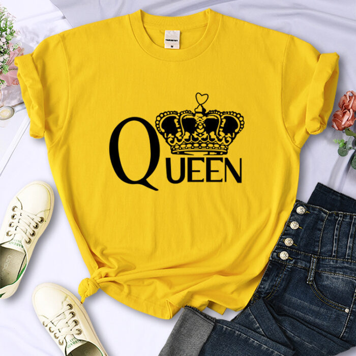 e71dacf8-0cfe-494c-bd44-2f1756976e0a.jpg Close-up of the bold crown print and breathable fabric on a crown print cotton shirt.