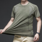 A man staying cool in the summer heat wearing a breathable mens ice silk t shirt.