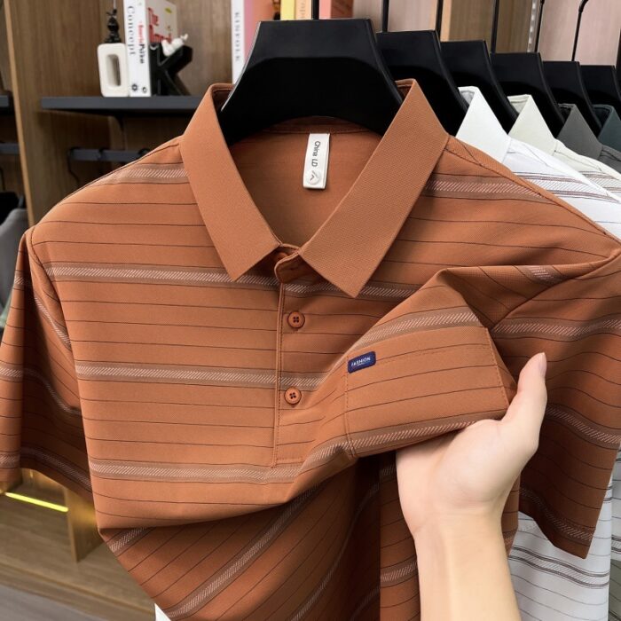 A stylish man wearing a comfortable mens striped polo shirt for a smart casual weekend look.