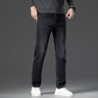 A stylish man wearing comfortable mens straight leg jeans ph for a business casual look.