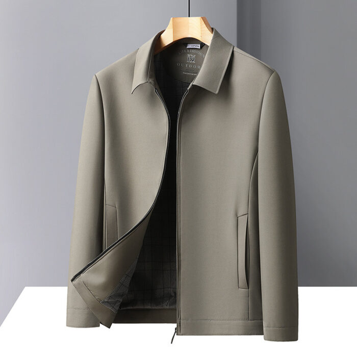 fb811af1-cd03-4a07-bc88-029cb0ac098d.jpg A stylish man wearing a versatile mens casual collared jacket over a comfortable t-shirt.