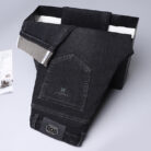 A stylish man wearing comfortable mens straight leg jeans ph for a business casual look.