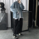A stylish man wearing a versatile mens vintage wash denim jacket for an effortless streetwear look from K&K Trend Wear.