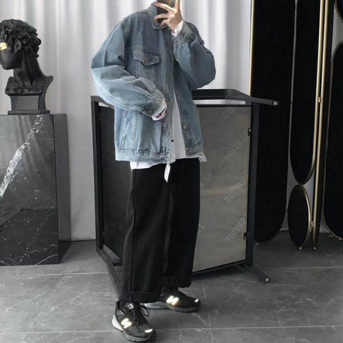 A stylish man wearing a versatile mens vintage wash denim jacket for an effortless streetwear look from K&K Trend Wear.