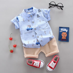 1386855995201.jpg A happy child wearing a comfortable toddler boy cotton 2 piece outfit for everyday play from K&K Trend Wear.