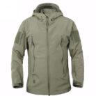 A man exploring the outdoors wearing a durable mens waterproof softshell jacket for maximum weather protection from K&K Trend Wear.