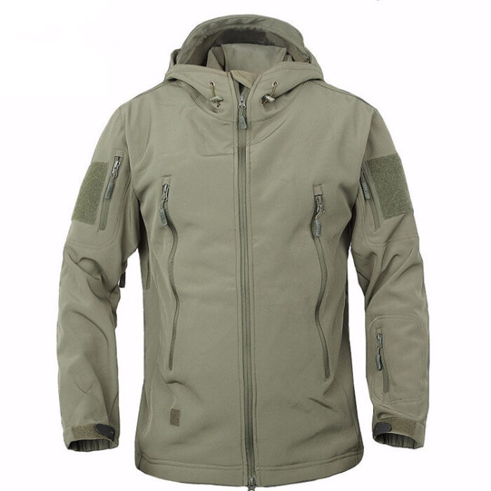 A man exploring the outdoors wearing a durable mens waterproof softshell jacket for maximum weather protection from K&K Trend Wear.