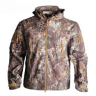 A man exploring the outdoors wearing a durable mens waterproof softshell jacket for maximum weather protection from K&K Trend Wear.