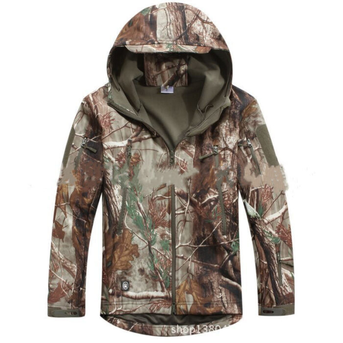 A man exploring the outdoors wearing a durable mens waterproof softshell jacket for maximum weather protection from K&K Trend Wear.