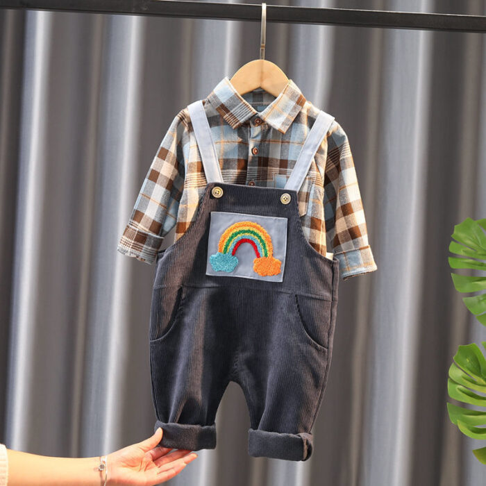 1621864997471.jpg A handsome little boy ready for a special occasion wearing a toddler boy formal suspender outfit from K&K Trend Wear.