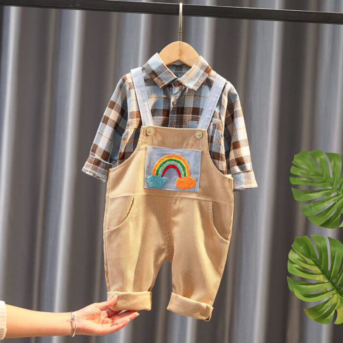 1621864997472.jpg A handsome little boy ready for a special occasion wearing a toddler boy formal suspender outfit from K&K Trend Wear.
