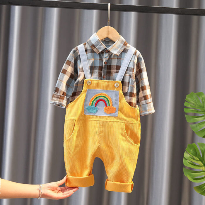 1621864997474.jpg A handsome little boy ready for a special occasion wearing a toddler boy formal suspender outfit from K&K Trend Wear.