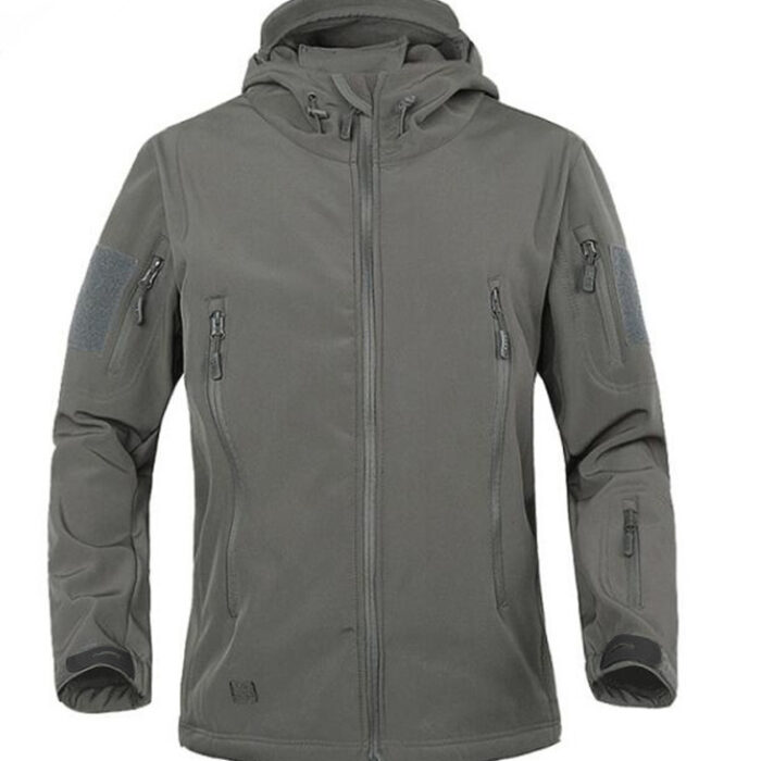 A man exploring the outdoors wearing a durable mens waterproof softshell jacket for maximum weather protection from K&K Trend Wear.