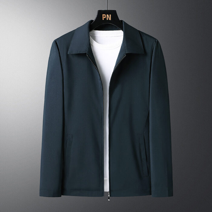A stylish man wearing a versatile mens smart casual collared jacket for a sharp office look from K&K Trend Wear.