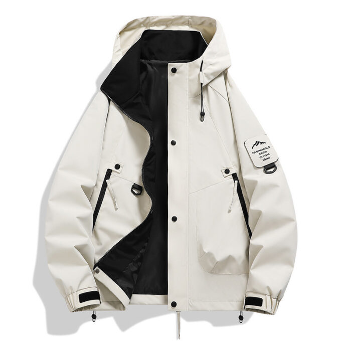 A stylish man wearing a practical mens waterproof windbreaker jacket to protect against the rain and wind from K&K Trend Wear.
