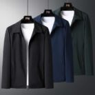 A stylish man wearing a versatile mens smart casual collared jacket for a sharp office look from K&K Trend Wear.