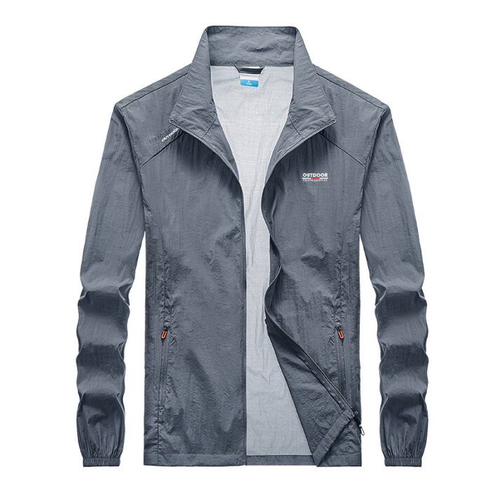 5d3f2925-e5cb-4536-8c87-781d849969c5.jpg A man outdoors wearing a versatile mens uv protection fishing jacket for summer sun protection from K&K Trend Wear.