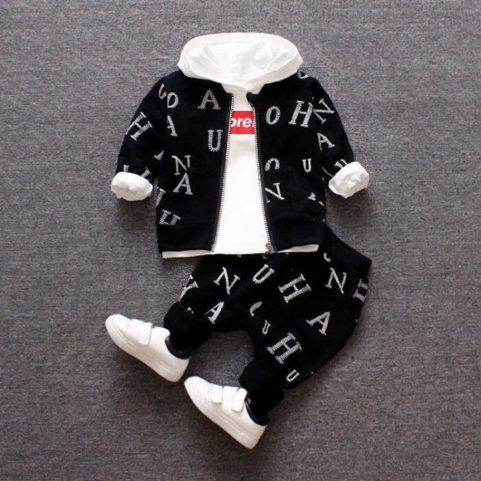 6028760207482.jpg A happy child wearing a comfortable kids 2 piece long sleeve outfit for everyday play from K&K Trend Wear.