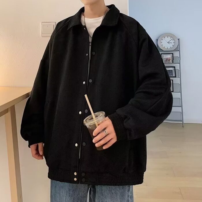 A stylish man wearing a versatile mens casual embroidered jacket for an effortless streetwear look from K&K Trend Wear.