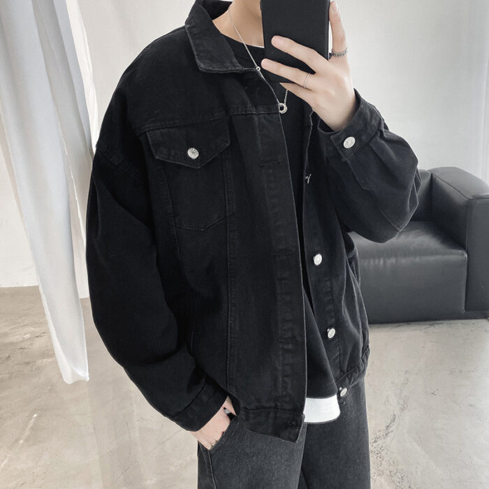 A stylish man wearing a versatile mens vintage wash denim jacket for an effortless streetwear look from K&K Trend Wear.