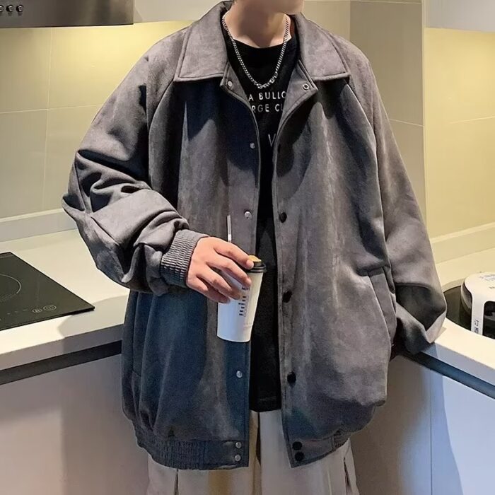 A stylish man wearing a versatile mens casual embroidered jacket for an effortless streetwear look from K&K Trend Wear.