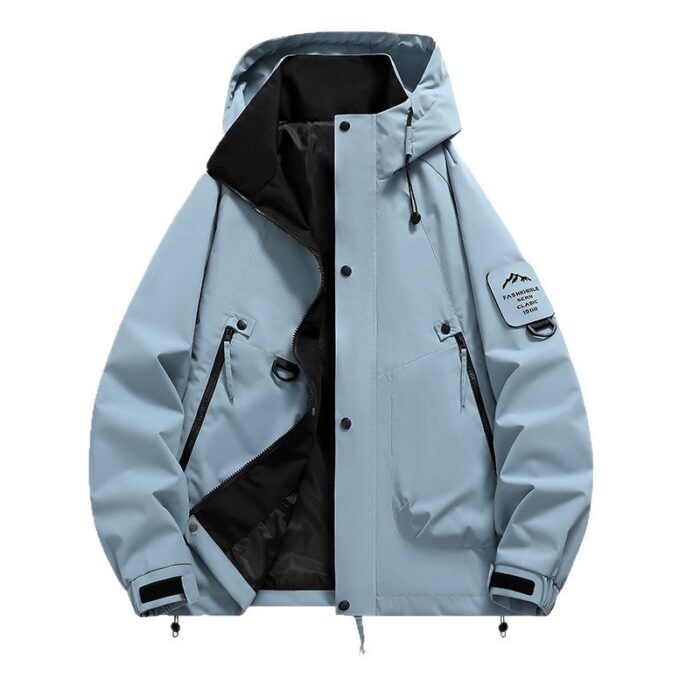 A stylish man wearing a practical mens waterproof windbreaker jacket to protect against the rain and wind from K&K Trend Wear.