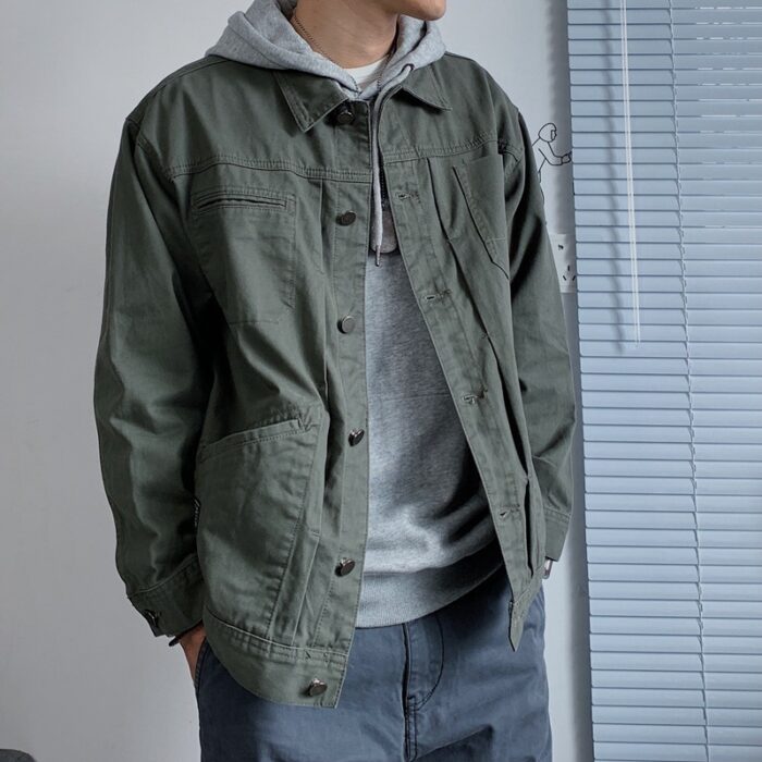 77f6f7ef-9322-41f0-a257-be46ce09840c.jpg A stylish man wearing a versatile mens retro denim jacket for an effortless streetwear look from K&K Trend Wear.