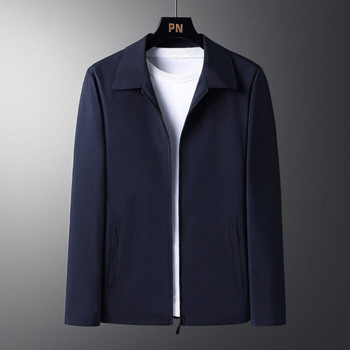 A stylish man wearing a versatile mens smart casual collared jacket for a sharp office look from K&K Trend Wear.