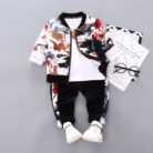 A happy little boy wearing a stylish toddler boy 3 piece outfit ready for a family party from K&K Trend Wear.