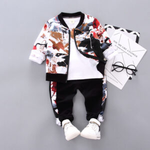 9231e752-83e7-4cd2-9199-35c850a7d01b.jpg A happy little boy wearing a stylish toddler boy 3 piece outfit ready for a family party from K&K Trend Wear.