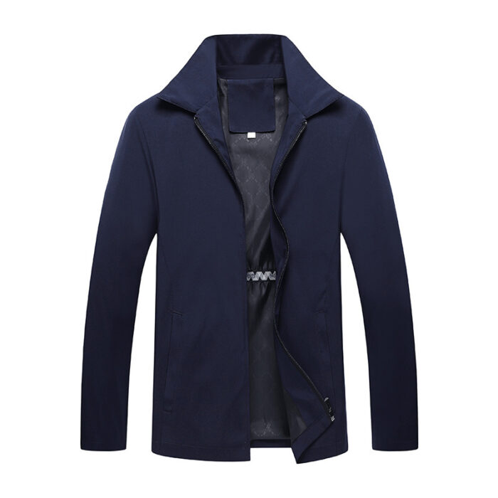 A stylish man wearing a versatile mens smart casual collared jacket for a sharp office look from K&K Trend Wear.