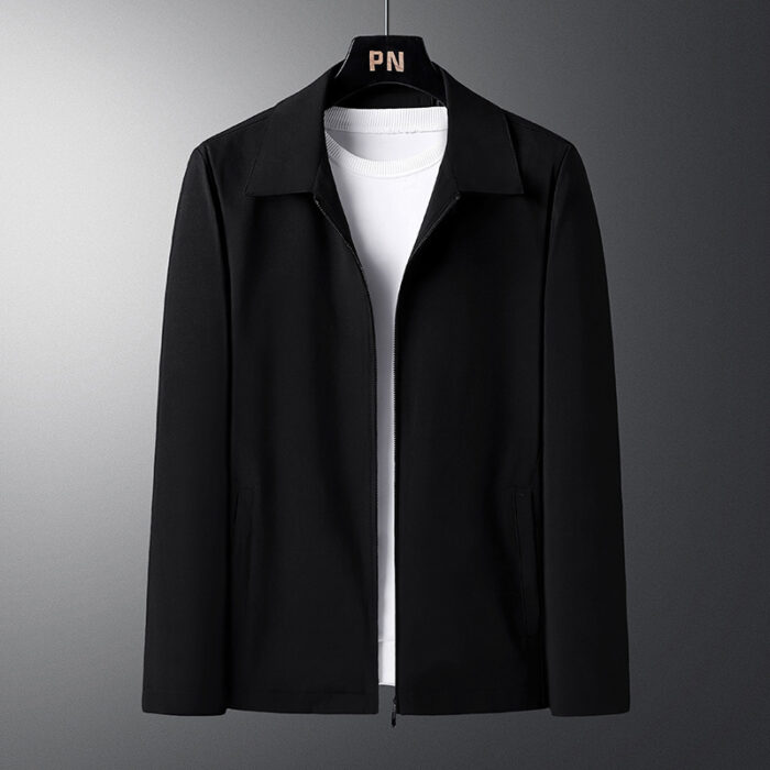 A stylish man wearing a versatile mens smart casual collared jacket for a sharp office look from K&K Trend Wear.