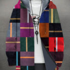 A stylish man wearing a warm mens fleece lined graphic jacket for a bold streetwear look from K&K Trend Wear.