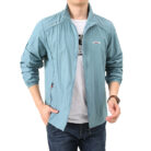 A man outdoors wearing a versatile mens uv protection fishing jacket for summer sun protection from K&K Trend Wear.