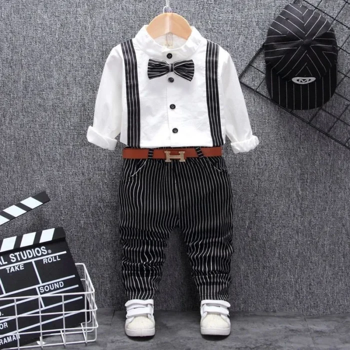 toddler-boy-formal-suspender-outfit-set A handsome little boy ready for a special occasion wearing a toddler boy formal suspender outfit from K&K Trend Wear.